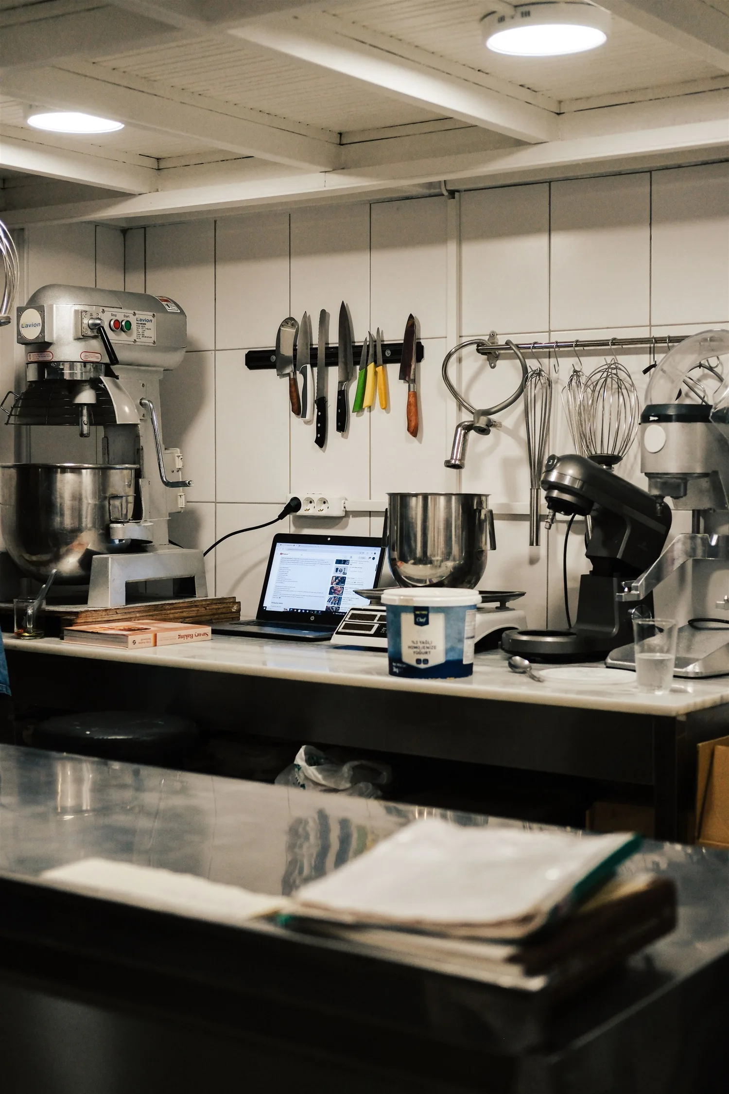 Work surfaces and equipment in a commercial kitchen